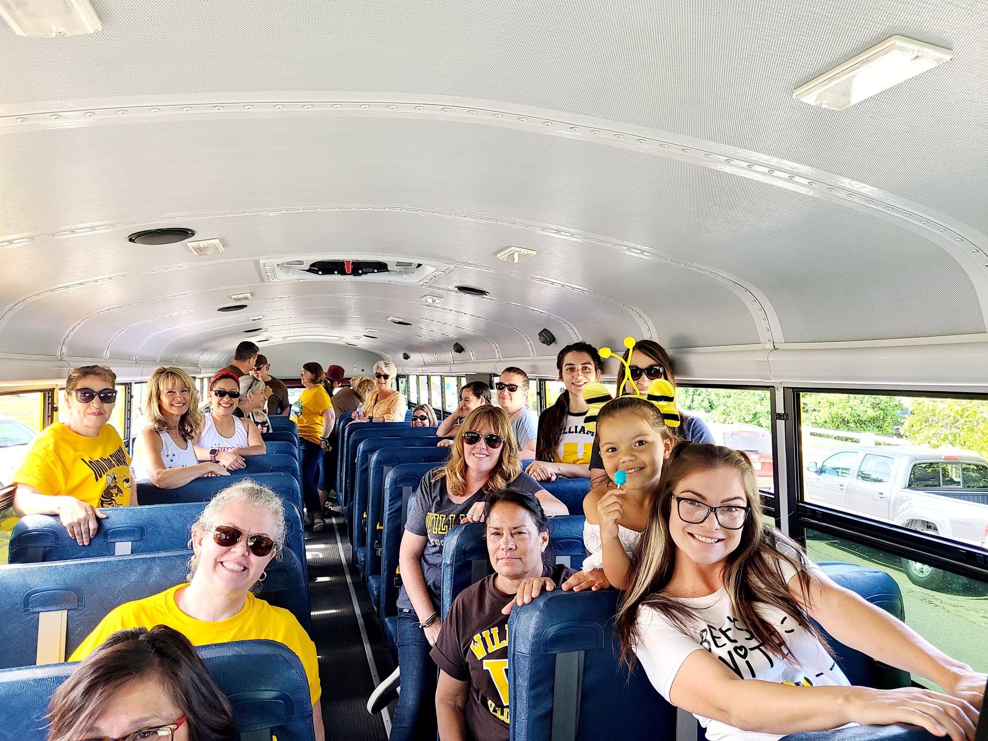 staff sitting in school bus